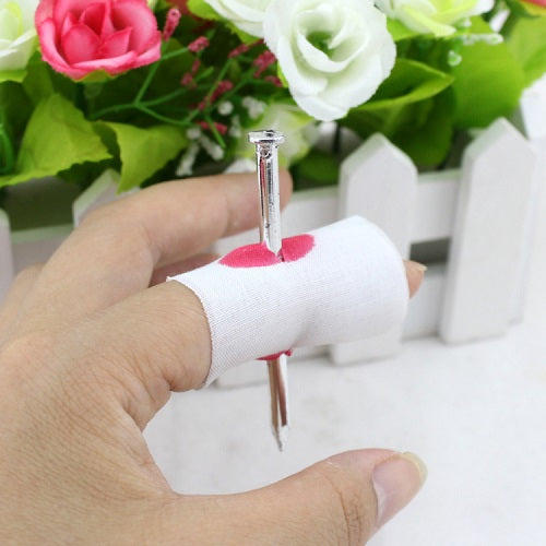 Nail Through Finger