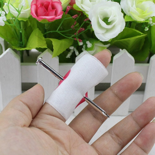 Nail Through Finger